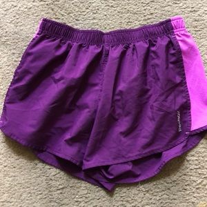 Purple & pink Reebok running shorts